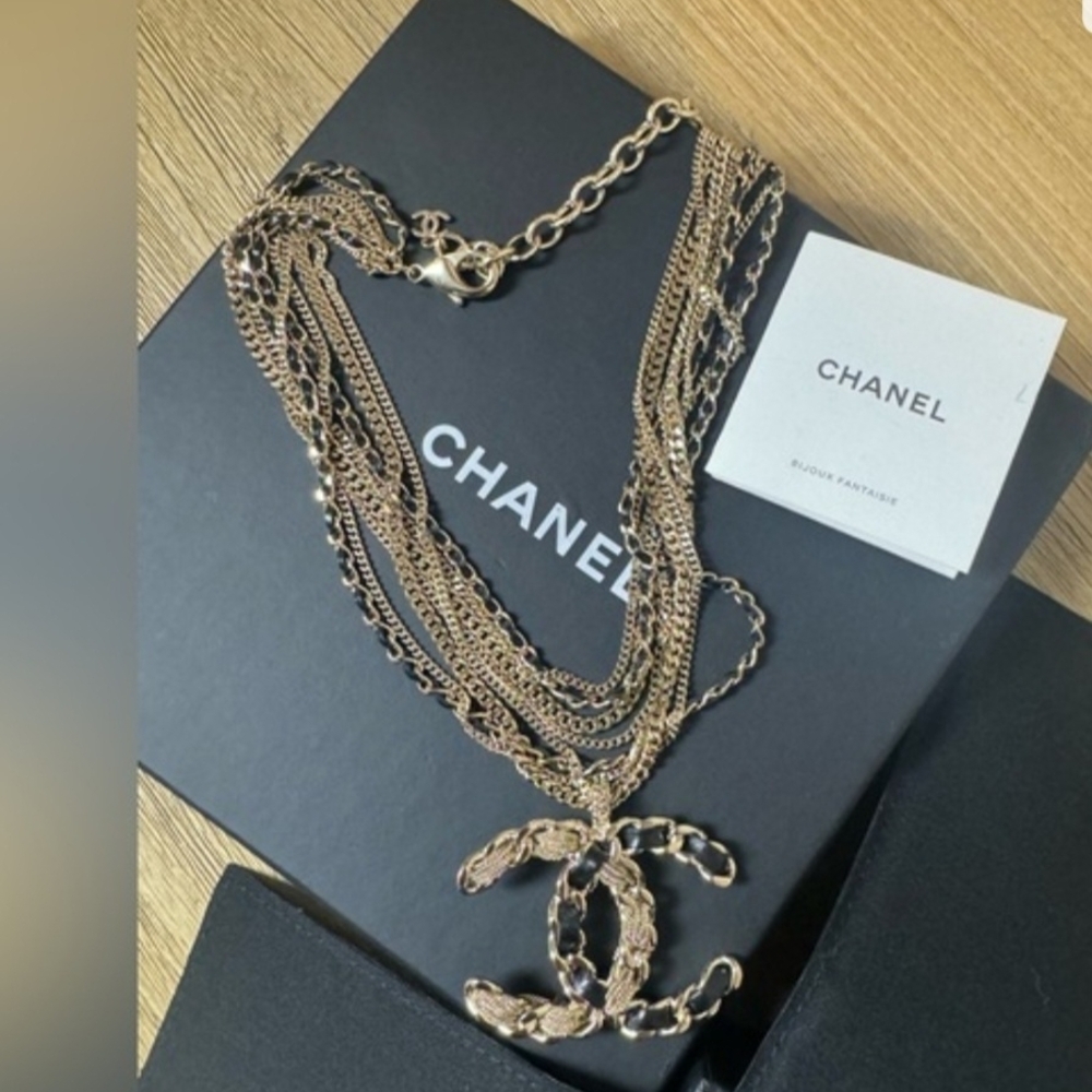 CHANEL Gold-Tone Multi Chain Necklace with Interlocking CC Charm